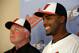 Baltimore Orioles' Nelson Cruz, right, and manager Buck Showalter pose for pictures after Cruz was introduced to the media during a news conference at the Ed Smith Stadium complex before the team's baseball spring training workout in Sarasota, Fla., Tuesday, Feb. 25, 2014. The Orioles signed a one- year deal with Cruz. (AP Photo/Gene J. Puskar)