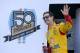 Joey Logano waves to the crowd during driver introductions prior to the NASCAR Sprint Cup Series auto race Sunday, March 2, 2014, in Avondale, Ariz. (AP Photo/Ross D. Franklin)