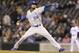 Kansas City Royals starting pitcher Ervin Santana throws against the Seattle Mariners a baseball game Wednesday, Sept. 25, 2013, in Seattle. (AP Photo/Elaine Thompson)