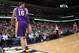 Los Angeles Lakers center Pau Gasol, of Spain, looks over his shoulder as he walks off court to lockerroom after suffering an injury against the Denver Nuggets in the first quarter of an NBA basketball game in Denver on Friday, March 7, 2014. (AP Photo/David Zalubowski)