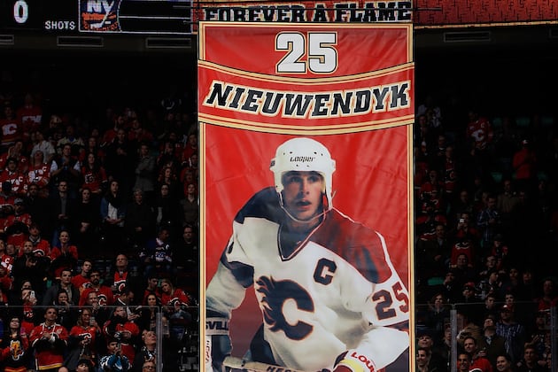 Video: Flames Great Joe Nieuwendyk Has No. 25 Raised to Rafters at Saddledome