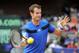 Britain's Andy Murray plays during a match against Sam Querrey at the Davis Cup tennis matches Sunday, Feb. 2, 2014, in San Diego. (AP Photo/Denis Poroy)