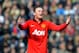 Manchester United's Wayne Rooney shouts instructions to team mates during the English Premier League soccer match between West Bromwich Albion and Manchester United at The Hawthorns Stadium in West Bromwich, England, Saturday, March 8, 2014. (AP Photo/Rui Vieira)