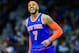 Feb 22, 2014; Atlanta, GA, USA; New York Knicks small forward Carmelo Anthony (7) celebrates after shooting a three in the second half against the Atlanta Hawks at Philips Arena. The Hawks won 107-98. Mandatory Credit: Daniel Shirey-USA TODAY Sports