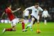 LONDON, ENGLAND - MARCH 05: Wayne Rooney of England goes past Daniel Agger of Denmark during the International Friendly match between England and Denmark at Wembley Stadium on March 5, 2014 in London, England. (Photo by Laurence Griffiths/Getty Images)