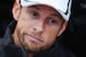 JEREZ DE LA FRONTERA, SPAIN - JANUARY 29: Jenson Button of Great Britain and McLaren is interviewed by the media following day two of Formula One Winter Testing at the Circuito de Jerez on January 29, 2014 in Jerez de la Frontera, Spain. (Photo by Mark Thompson/Getty Images)