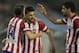 Atletico's David Villa, center, celebrates scoring the first goal against Real Club Celta with his teammates during a Spanish La Liga soccer match at the Balaidos stadium in Vigo, Spain, Saturday, March 8, 2014. (AP Photo/Lalo R. Villar)