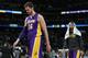 Los Angeles Lakers center Pau Gasol, left, of Spain, and guard Kendall Marshall head off the court after the Denver Nuggets' 134-126 victory over the Lakers in an NBA basketball game in Denver on Friday, March 7, 2014. (AP Photo/David Zalubowski)