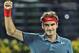Roger Federer of Switzerland celebrates after he beat Novak Djokovic of Serbia during a semifinal match of the Dubai Tennis Championships in Dubai, United Arab Emirates, Friday, Feb. 28, 2014. (AP Photo/Kamran Jebreili)