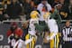 CHICAGO, IL - DECEMBER 29: Sam Shields #37 of the Green Bay Packers intercepts the final throw of the game in front of teammate Jarrett Bush #24 and Brandon Marshall #15 of the Chicago Bears at Soldier Field on December 29, 2013 in Chicago, Illinois. The Packers defeated the Bears 33-28. (Photo by Jonathan Daniel/Getty Images)