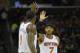 Mar 8, 2014; Cleveland, OH, USA; New York Knicks small forward Carmelo Anthony (7) celebrates with power forward Amar'e Stoudemire (1) in the fourth quarter against the Cleveland Cavaliers at Quicken Loans Arena. Mandatory Credit: David Richard-USA TODAY Sports