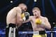 LAS VEGAS, NV - MARCH 8: Canelo Alvarez throws a punch against Alfredo Angulo (L) during the non-title, 12-round super welterweight bout at the MGM Grand Garden March 8, 2014, in Las Vegas, Nevada. Alvarez won by technical knock out after the referee stopped the fight in the 10th round. (Photo by Kevork Djansezian/Getty Images)