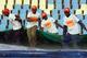 Ground workers pulls the covers over the wicket as rain begins to fall just before the end of the second day of the South Africa versus Australia cricket test match at Centurion Park in Pretoria, South Africa, Thursday, Feb. 13, 2014. (AP Photo/Themba Hadebe)