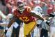 LOS ANGELES, CA - SEPTEMBER 21: Devon Kennard #42 of the USC Trojans celebrates his sack on third down during a 17-14 win over the Utah State Aggies at the Los Angeles Memorial Coliseum on September 21, 2013 in Los Angeles, California. (Photo by Harry How/Getty Images)