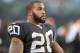 OAKLAND, CA - DECEMBER 29: Darren McFadden #20 of the Oakland Raiders looks on from the sidelines against the Denver Broncos during the fourth quarter at O.co Coliseum on December 29, 2013 in Oakland, California. The Broncos won the game 34-14. (Photo by Thearon W. Henderson/Getty Images)