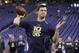 Alabama quarterback AJ McCarron throws during a drill at the NFL football scouting combine in Indianapolis, Sunday, Feb. 23, 2014. (AP Photo/Michael Conroy)
