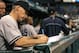 July 4, 2012; St. Petersburg, FL, USA; New York Yankees manager Joe Girardi (28) looks down and changes the lineup against the Tampa Bay Rays at Tropicana Field. New York Yankees defeated the Tampa Bay Rays 4-3. Mandatory Credit: Kim Klement-USA TODAY Sports