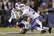 Miami Dolphins Brian Hartline (82) fumbles the ball asBuffalo Bills' Stephon Gilmore (27) and Jairus Byrd (31) hit him during the first half of an NFL football game Thursday, Nov. 15, 2012 in Orchard Park, N.Y. Byrd recovered the fumble on the play.(AP Photo/Gary Wiepert)