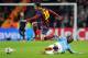 Manchester City's Yaya Toure, right, attempts a tackle Barcelona's Lionel Messi during their Champions League Round of 16 soccer match at the Etihad Stadium in Manchester, England, Tuesday, Feb. 18, 2014. (AP Photo/Clint Hughes)