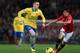 MANCHESTER, ENGLAND - NOVEMBER 10: Shinji Kagawa of Manchester United competes with Thomas Vermaelen of Arsenal during the Barclays Premier League match between Manchester United and Arsenal at Old Trafford on November 10, 2013 in Manchester, England. (Photo by Alex Livesey/Getty Images)
