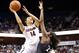 Mar 8, 2014; Uncasville, CT, USA; Connecticut Huskies guard Bria Hartley (14) shoots against Cincinnati Bearcats guard Jasmine Whitfield (23) during the first half in the quarterfinal round of the American League Athletic Conference Tournament at Mohegan Sun Arena. Mandatory Credit: David Butler II-USA TODAY Sports