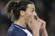 Paris Saint Germain's Zlatan Ibrahimovic of Sweden gestures to his teammates during the French League One soccer match against Marseille, at the Parc des Princes stadium, in Paris, Sunday, March 2 , 2014. (AP Photo/Lionel Cironneau)