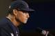 Chicago Bears head coach Marc Trestman answers a question during a news conference at the NFL football scouting combine in Indianapolis, Thursday, Feb. 20, 2014. (AP Photo/Michael Conroy)