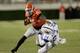 ATHENS, GA - NOVEMBER 23: Running back J.J. Green #15 of the Georgia Bulldogs runs over defensive back Blake McClain #24 of the Kentucky Wildcats during the game at Sanford Stadium on November 23, 2013 in Athens, Georgia. (Photo by Mike Zarrilli/Getty Images)