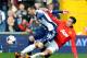 Manchester United's Robin van Persie tackles West Brom's Morgan Amalfitano during the English Premier League soccer match between West Bromwich Albion and Manchester United at The Hawthorns Stadium in West Bromwich, England, Saturday, March 8, 2014. (AP Photo/Rui Vieira)