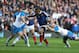 EDINBURGH, SCOTLAND - MARCH 08: Mathieu Bastareaud of France is tackled by Ryan Grant (L) and Scott Lawson during the RBS Six Nations match between Scotland and France at Murrayfield Stadium on March 8, 2014 in Edinburgh, Scotland. (Photo by David Rogers/Getty Images)