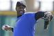Retired NBA All-Star Tracy McGrady throws a pitch at the Sugar Land Skeeters baseball stadium Wednesday, Feb. 12, 2014, in Sugar Land, Texas. McGrady hopes to try out as a pitcher for the independent Atlantic League Skeeters. (AP Photo/Pat Sullivan)
