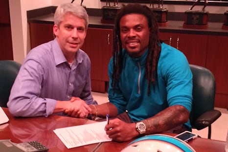 Dolphins Sign Louis Delmas