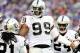 EAST RUTHERFORD, NJ - NOVEMBER 10: Lamarr Houston #99 of the Oakland Raiders celebrates after he recovers a fumble by Peyton Hillis of the New York Giants at MetLife Stadium on November 10, 2013 in East Rutherford, New Jersey. (Photo by Elsa/Getty Images)