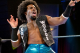 In this July 31, 2013 photo, wrestlers Xavier Woods, left, and Corey Graves pose inside the new World Wrestling Entertainment Performance Center in Orlando, Fla. The $2.5 million, 26,000-square foot facility opened in July, replacing a smaller, antiquated facility in Tampa, Fla. The facility is both a graduate school and a training and rehabilitation center. (AP Photo/Kyle Hightower)