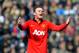 Manchester United's Wayne Rooney shouts instructions to team mates during the English Premier League soccer match between West Bromwich Albion and Manchester United at The Hawthorns Stadium in West Bromwich, England, Saturday, March 8, 2014. (AP Photo/Rui Vieira)
