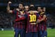 MANCHESTER, ENGLAND - FEBRUARY 18: Lionel Messi of Barcelona celebrates scoring the opening goal from a penalty kick with his team-mates during the UEFA Champions League Round of 16 first leg match between Manchester City and Barcelona at the Etihad Stadium on February 18, 2014 in Manchester, England. (Photo by Clive Brunskill/Getty Images)
