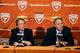 AUSTIN, TX - DECEMBER 15: University of Texas at Austin president Bill Powers, left, and Athletic Director Steve Patterson answer questions regarding the resignation of football coach Mack Brown on December 15, 2013 in Austin, Texas. Moments earlier, Brown announced he will step down as coach after the Valero Alamo Bowl game against Oregon on December 30. (Photo by Erich Schlegel/Getty Images)