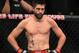 Aug 28, 2013; Indianapolis, IN, USA; Carlos Condit (pictured) fights Martin Kampmann during UFC Fight NIght 27 at Bankers Life Fieldhouse. Mandatory Credit: Pat Lovell-USA TODAY Sports