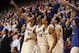 Feb 22, 2014; Lawrence, KS, USA; Kansas Jayhawks center Joel Embiid (21), guard Andrew Wiggins (22), forward Perry Ellis (34) and guard Wayne Selden, Jr. (1) react to a dunk in the second half against the Texas Longhorns at Allen Fieldhouse. Kansas won 85-54. Mandatory Credit: Denny Medley-USA TODAY Sports