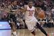 Ohio State's Lenzelle Smith, right, drives to the basket against Michigan State's Keith Appling during the second half of an NCAA college basketball game Sunday, March 9, 2014, in Columbus, Ohio. Ohio State defeated Michigan State 69-67. (AP Photo/Jay LaPrete)