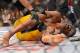 Dec 28, 2013; Las Vegas, NV, USA; Anderson Silva reacts after breaking his leg on a kick to Chris Weidman (not pictured) during their UFC middleweight championship bout at the MGM Grand Garden Arena. Mandatory Credit: Jayne Kamin-Oncea-USA TODAY Sports