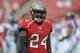 TAMPA, FL - NOVEMBER 17: Cornerback Darrelle Revis #24 of the Tampa Bay Buccaneers warms up for play against the Atlanta Falcons November 17, 2013 at Raymond James Stadium in Tampa, Florida. Tampa won 41 - 28. (Photo by Al Messerschmidt/Getty Images)
