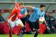 KLAGENFURT, AUSTRIA - MARCH 05: Luis Suarez of Uruguay (R) challenges Martin Hinteregger of Austria (L) during the international friendly match between Austria and Uruguay at Woerthersee stadium on March 5, 2014 in Klagenfurt, Austria. (Photo by Winnie Pessentheiner/Getty Images)