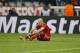 Bayern's Arjen Robben sits on the pitch during the Champions League round of 16 second leg soccer match between FC Bayern Munich and FC Arsenal in Munich, Germany, Wednesday, March 12, 2014. (AP Photo/Matthias Schrader)