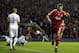 Liverpool's Steven Gerrard, right, reacts after scoring his second goal during their Champions League second round, second leg, soccer match against Real Madrid at Anfield Stadium, Liverpool, England, Tuesday, March 10, 2009. (AP Photo/Paul Thomas)