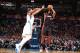 OKLAHOMA CITY, OK - FEBRUARY 20: LeBron James #6 of the Miami Heat shoots against Kevin Durant #35 of the Oklahoma City Thunder during a game at Chesapeake Energy Arena on February 20, 2014 in Oklahoma City, Oklahoma. NOTE TO USER: User expressly acknowledges and agrees that, by downloading and/or using this photograph, user is consenting to the terms and conditions of the Getty Images License Agreement. Mandatory Copyright Notice: Copyright 2014 NBAE (Photo by Nathaniel S. Butler/NBAE via Getty Images)