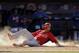 St. Louis Cardinals' Rafael Ortega scores on a single by Kolten Wong during the sixth inning of an exhibition spring training baseball game against the St. Louis Cardinals Friday, March 7, 2014, in Port St. Lucie, Fla. (AP Photo/Jeff Roberson)