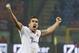 AS Roma midfielder Kevin Strootman, of the Netherlands, celebrates after scoring during the Serie A soccer match between AC Milan and Roma at the San Siro stadium in Milan, Italy, Monday, Dec. 16, 2013. (AP Photo/Antonio Calanni)
