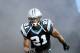 Carolina Panthers free safety Mike Mitchell (21) runs on the the field during player introductions before the start of an NFL football game in Charlotte, NC, Sunday, Dec. 15, 2013. (AP Photo / Mike McCarn)