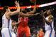 Mar 11, 2014; Oklahoma City, OK, USA; Houston Rockets shooting guard James Harden (13) attempts a shot against Oklahoma City Thunder small forward Kevin Durant (35) and Oklahoma City Thunder center Steven Adams (12) during the first quarter at Chesapeake Energy Arena. Mandatory Credit: Mark D. Smith-USA TODAY Sports